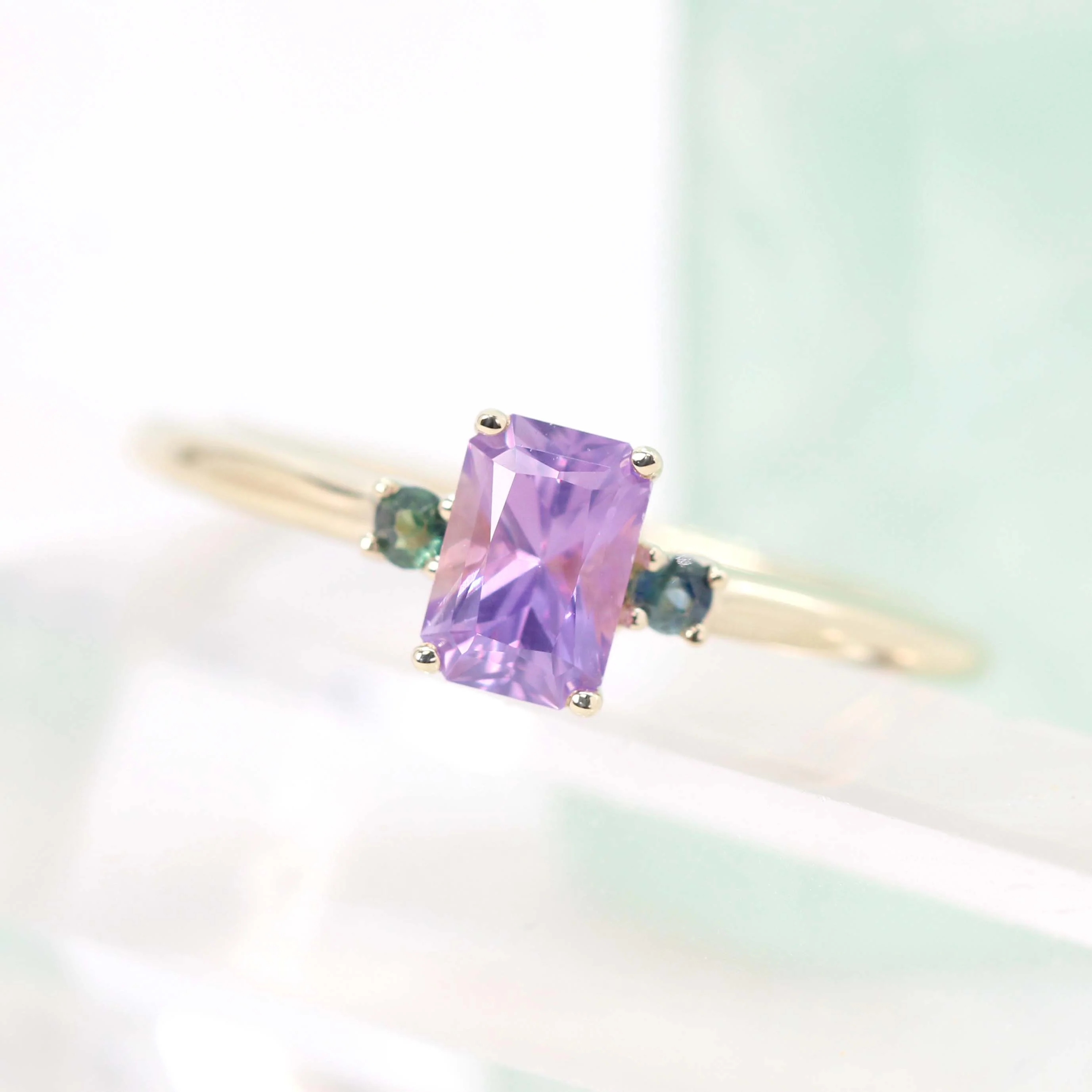 Terra Ring with a 0.81 Carat Radiant Cut Purple Sapphire and Teal Sapphire Accents in 14k Yellow Gold - Ready to Size and Ship - Image 7
