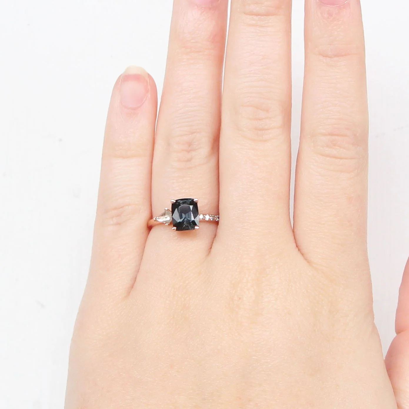 Project: Custom Zephyr Ring with a 2 Carat Emerald Cut Spinel and Salt and Pepper Accent Diamonds in 14k - Image 4